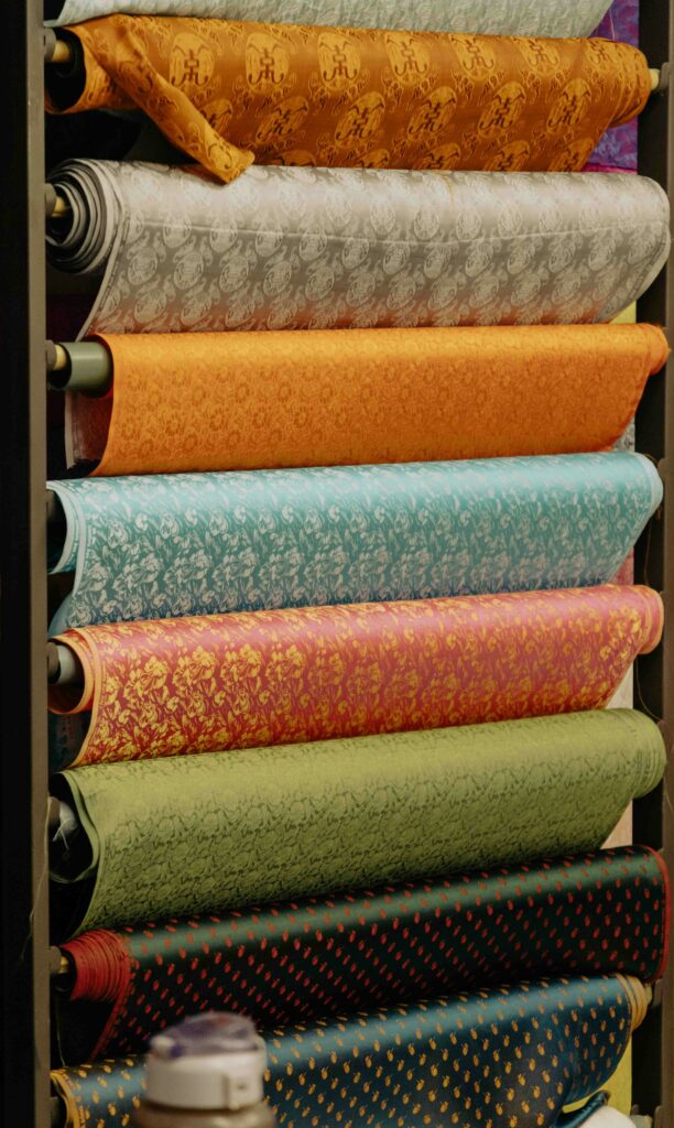 Different colours and fabrics of roller blinds